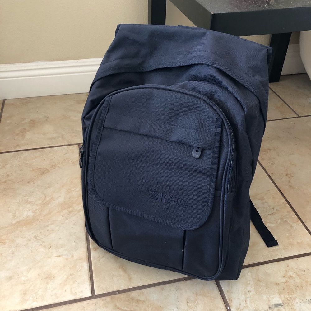 Navy backpack with front Velcro flap